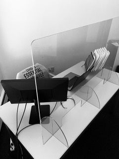 desk with plexiglass